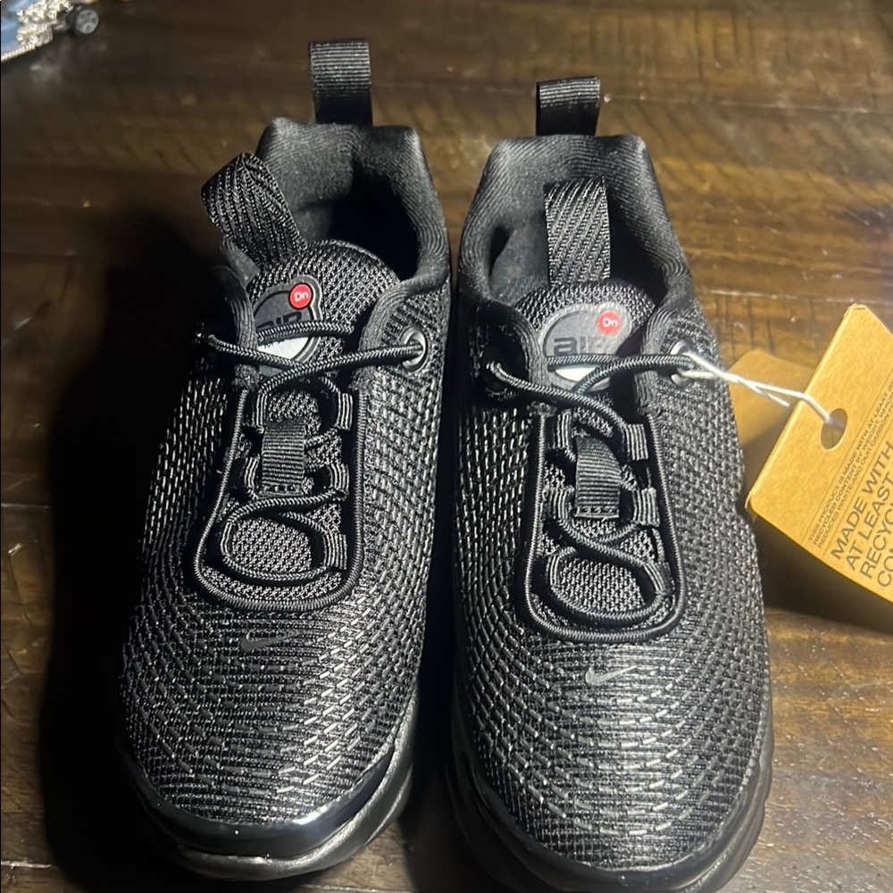 Nike Black Athletic Shoes with Textured Mesh Design